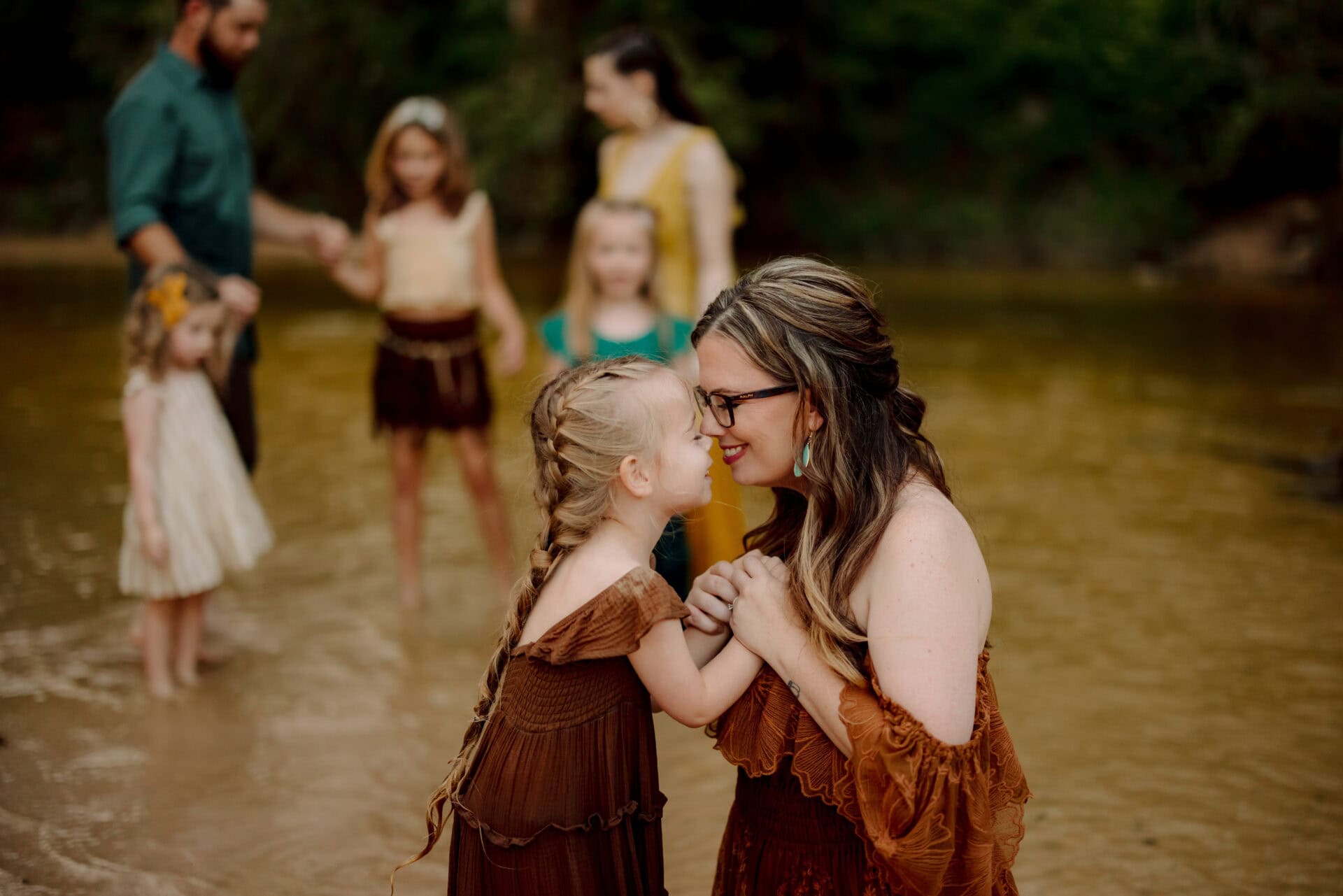 Family enjoying a moment in Hidden Creek, The Woodlands TX.